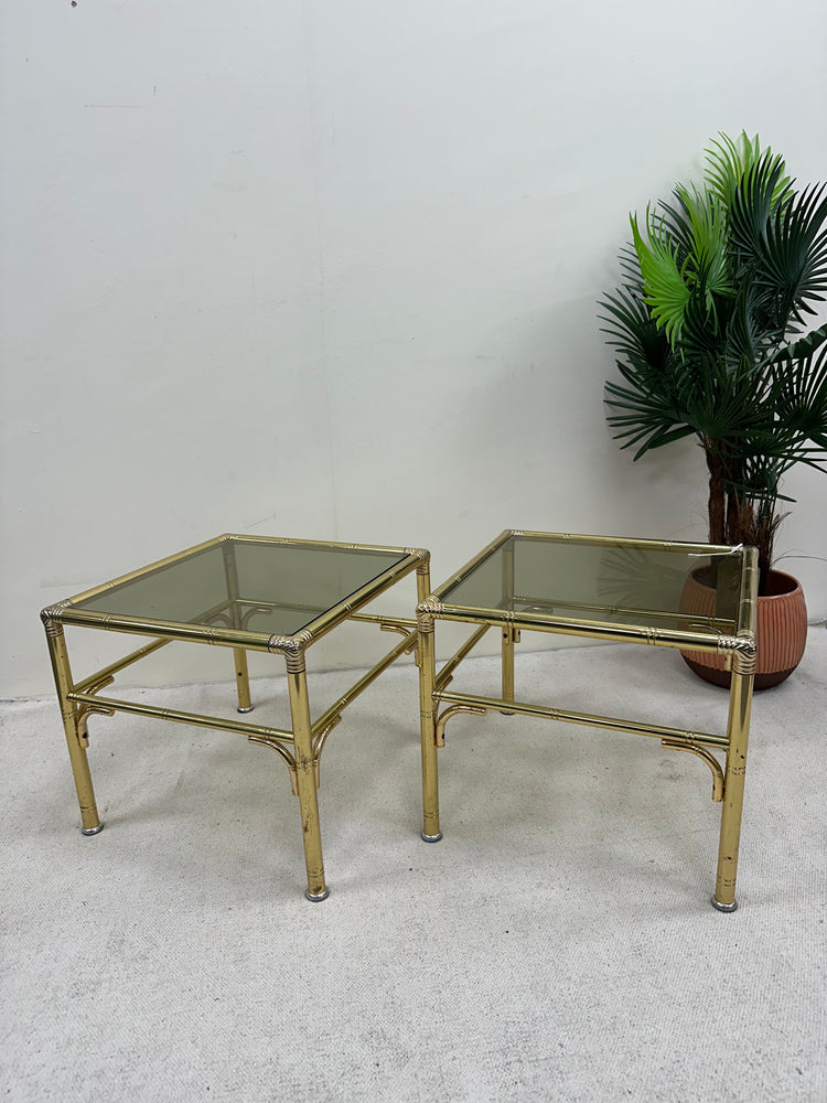 1970s pair of Hollywood Regency style Brass and smoked glass side table