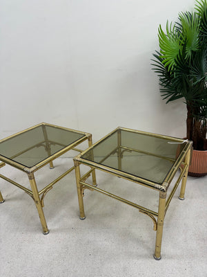 1970s pair of Hollywood Regency style Brass and smoked glass side table